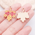 Thanksgiving maple leaf alloy pendants with yellow enamel finish and red bow detail - Yellow Enamel Bow Maple Leaf (25230)