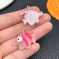 Pink resin tropical fish pendant for DIY jewelry with metal loop and pearlized back finish - Red Tropical Fish (24657)