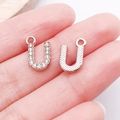 Silver letter U pendant set featuring one rhinestone pave and one textured metal finish - Letter U
