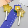 Pendentif sucette étoile en résine jaune avec paillettes et anneau métal pour bricolage - Sucette Étoile Résine Transparent Jaune (24179)