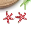 Detail of red enamel starfish pendants with white polka dots for DIY jewelry making - Medium / Medium Red Polka Dot Style (T1236)
