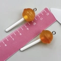 Paire de pendentifs sucettes en résine orange translucide avec paillettes et anneaux - Sucette Résine Transparent Orange (24176)