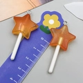 Pendentifs sucettes étoiles en résine orange avec paillettes et anneaux pour DIY - Sucette Étoile Résine Transparent Orange (24185)