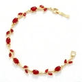 Detail of vine-shaped gold bracelet with oval ruby gemstones and marquise leaf accents - Gold Red Tulip Bracelet