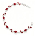 Detail of leaf-shaped vine bracelet with oval red gemstones and marquise accents - Silver Red Tulip Bracelet