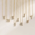 Golden balloon style initial necklaces with micro-paved cubic zirconia alphabet pendants - Letter A / Gold