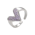 Macro view of adjustable silver V-shaped ring with micro-pave purple zircon stones - White Gold Purple Zirconia