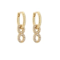Detail of gold-plated figure-eight dangle earrings with micro-pave cubic zirconia crystals - Gold Infinity Symbol Style (Size 13)