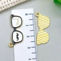 Detailed size view of an alloy glasses pendant with Dad gold text and mustache icon - Mustache Glasses