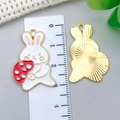 Detail of alloy rabbit charm with enamel finish and textured gold back for DIY jewelry - White Mushroom Rabbit Style (23175)