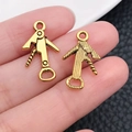 Detailed close-up of golden alloy wine opener charms showing front and back texture - Mini Corkscrew Shape