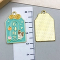 Detail view of mint green enamel charms showing front calligraphy and gold metal back - Blue Chinese Style Success Blessing Charm (23208)