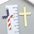 Detail of 4cm American flag cross pendant with golden back and ruler for size reference - USA Flag Independence Day Star Cross (23124)