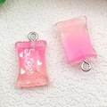 Macro detail of pink gradient resin candy bag pendants with glitter and Sweet text - Rose Red Gradient Resin Candy (17114)