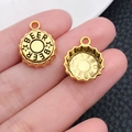 Pair of antique gold beer cap charms with star engraving for DIY jewelry making - Wine Bottle Shape