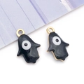 Golden Hamsa hand charm with black enamel and evil eye detail for jewelry making - Hand Shape / Black