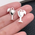 Detail of silver cocktail glass charm with lemon slice for DIY jewelry making - Wine Glass With Lemon