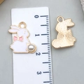 Pink rabbit moon wreath alloy pendant with bow and pearl detail, size 2cm by 1.5cm - White Beaded Rabbit (11940)