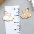 Cartoon rabbit pendant in gold alloy with pink cherry blossom pattern and enamel finish - Pink Ear White Rabbit (23085)
