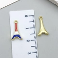 Golden Eiffel Tower charm with red, white, and blue enamel and 2.3cm height measurement - USA Flag Independence Day Tower (23109)