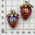 Red-purple gradient strawberry pendant with silver leaves on measurement mat - Red Transparent Iridescent Strawberry (22939)