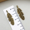 Pair of antique bronze feather charms 3.1cm long for DIY necklace and earring making - Antique Bronze (1423)