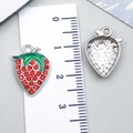 Ciondolo fragola scintillante in cristallo rosso e smalto verde per gioielli fai da te - Forma di Fragola con Strass (23447)