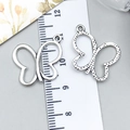 Silver alloy butterfly pendants with embossed dotted texture and smooth finish for DIY crafts - Butterfly (8054)