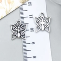Pair of vintage silver alloy butterfly pendants with hollow wings for DIY jewelry - Butterfly (8055)