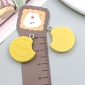 Yellow resin biscuit charm pendant with metal loop for DIY jewelry and keychains - Yellow Resin Biscuit (23821)
