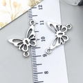 Vintage silver butterfly alloy pendants with hollow design for DIY jewelry making - Double Loop Butterfly (10048)