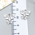 Two vintage silver butterfly charms for DIY jewelry with detailed wing patterns - Butterfly (10420)