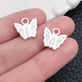 Pair of silver-tone butterfly alloy pendants for DIY jewelry making and crafting - Butterfly Style 12x12mm (20185)
