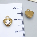 Detail of DIY heart pendants with gold plating and white zircon next to a scale ruler - Gold Heart (T2393)