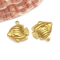 Detailed macro view of gold hollow tropical fish pendants with scales for DIY jewelry making - Large Tropical Fish (T1964) / Gold