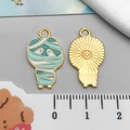Enamel mummy charm for DIY jewelry with turquoise bandage texture and gold metal back - Lake Blue Halloween Mummy (15134)
