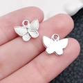 Ciondolo a farfalla argento per gioielli fai-da-te con texture a rete e anello tondo - Ciondolo Argento Lucido a Forma di Farfalla (20193)