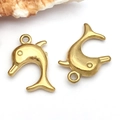 Detailed view of a golden dolphin charm with matte finish for DIY jewelry on white background - Dolphin (T2265)