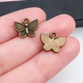 Pendentif papillon vintage en alliage de bronze pour bijoux DIY avec texture grillagée - Forme de Papillon 13x11mm (20155)