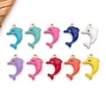 Detailed view of ten colorful enamel dolphin pendants with golden metal outlines - Random 10 Pcs / Gold Dolphin (T2750)