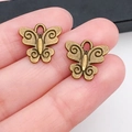 Gros plan de pendentifs papillon en alliage de bronze pour la création de bijoux - Forme de Papillon 13x13mm (20160)