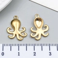 Detailed view of octopus charms in gold stainless steel with size scale measurement - Gold Octopus Style (T3026)