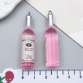 Mini ciondoli a bottiglia in resina rosa con anelli in argento per gioielli fai-da-te - Bottiglia di Vino in Resina Rosa Trasparente