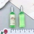 Ciondolo mini bottiglia in resina verde con gancio argento per gioielli fai da te - Bottiglia di Vino in Resina Verde Trasparente
