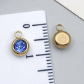 Golden stainless steel charm with faceted royal blue gemstone and scale measurement - Gold-Light Blue