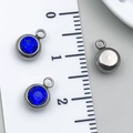 Deep blue birthstone pendant with stainless steel base and 8mm round faceted glass - Steel - Dark Blue