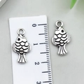 Detail of small fish pendants in antique silver with fine scales and hanging rings - Ocean Grass Carp Shape (22300)
