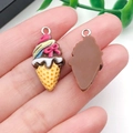 Detailed view of DIY resin ice cream cone pendants with pink bows and metal loops - Coffee Brown Base Yellow Bow (24504)