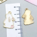 White and pink enamel rabbit charm in golden finish with a metal carrot detail - White Enamel Rabbit