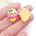 Detail view of the flat resin back and 3D ice cream cone front with cherry detail - Yellow Base Green Ice Cream Cone